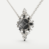 Front-facing view of a gothic-style pendant necklace featuring a polished black gemstone set in an intricate silver floral frame.