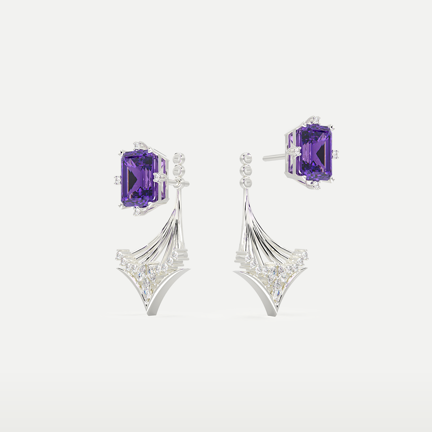 Close-up of handcrafted gemstone setting on Celestial Arc Earrings highlighting emerald-cut stone and marquise-cut accents