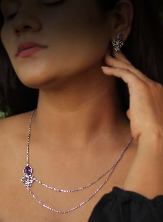 Model wearing handcrafted amethyst gemstone necklace and matching earrings in 925 sterling silver – elegant layered jewelry set for women by Praise Jewels
